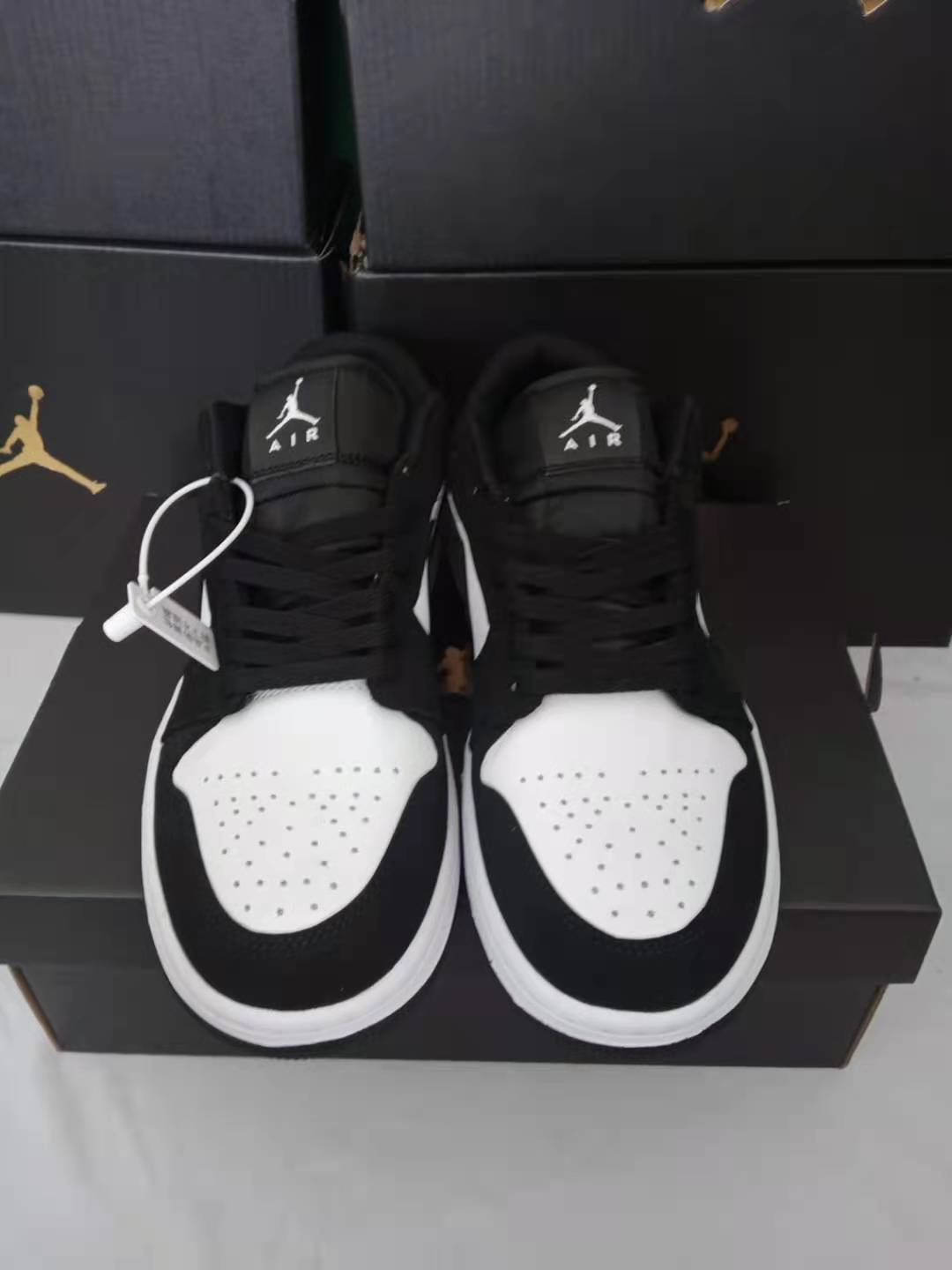 Nike Air Jordan 1 Low – Negro / Blanco