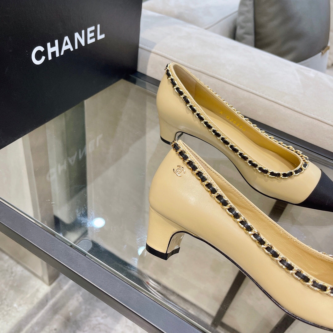 CHANEL Chain-Trim Cap-Toe Pumps