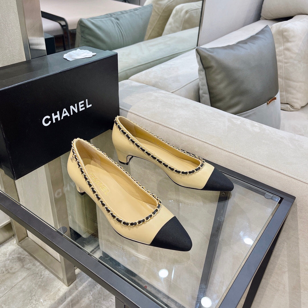CHANEL Chain-Trim Cap-Toe Pumps