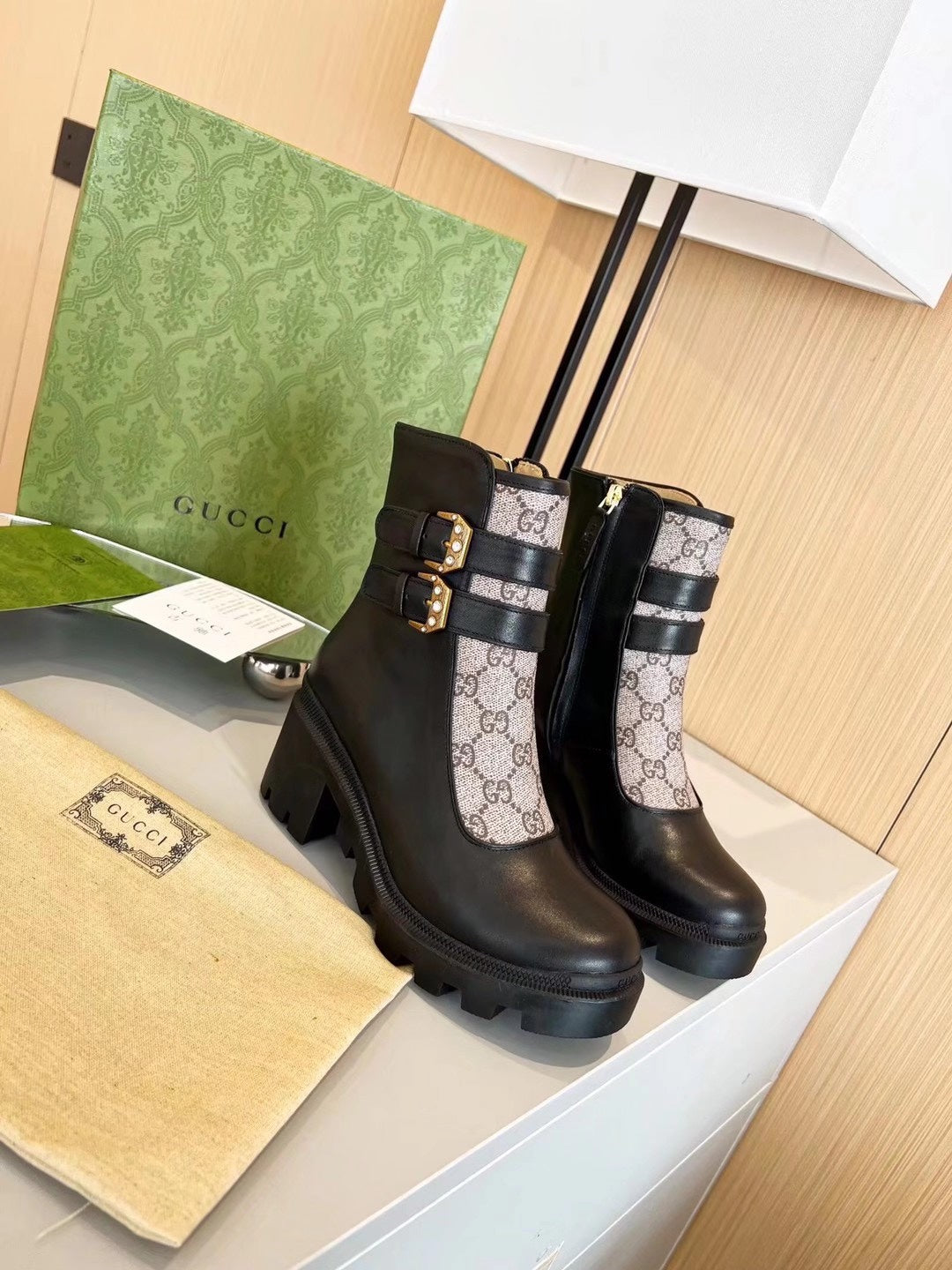 GUCCI GG SUPREME DOUBLE-BUCKLE PLATFORM BOOTS – BEIGE / BLACK