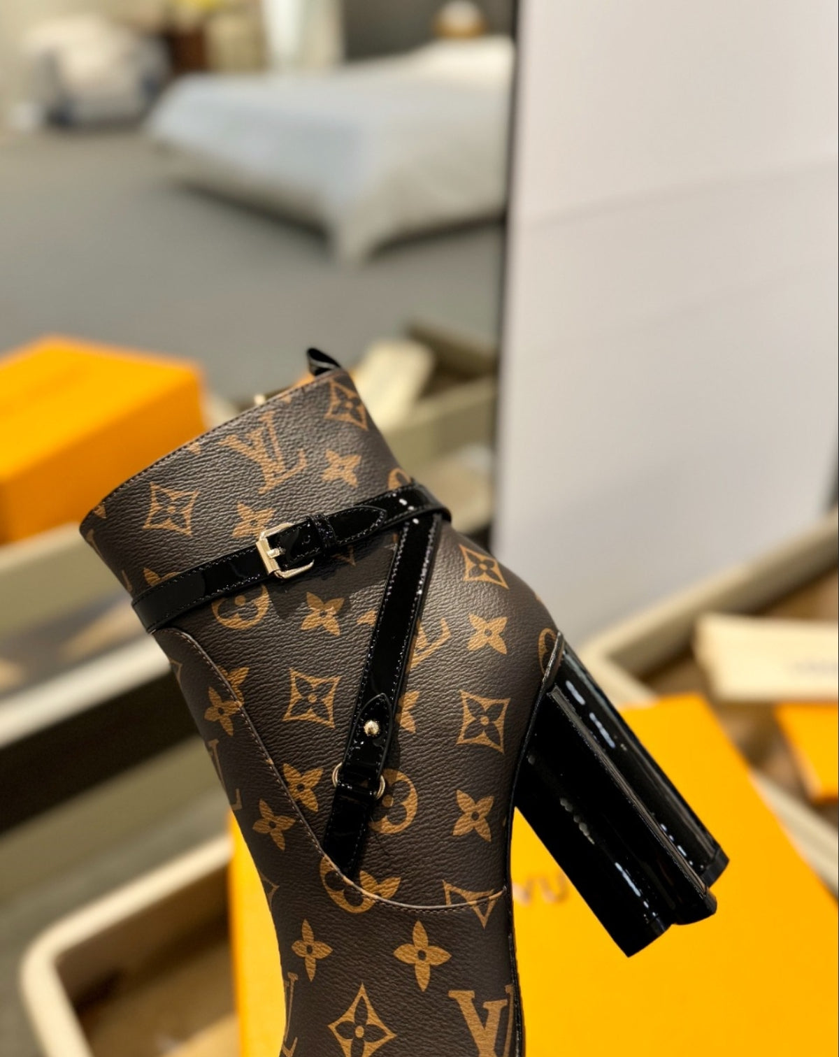 LOUIS VUITTON MONOGRAM BELTED ANKLE BOOTS