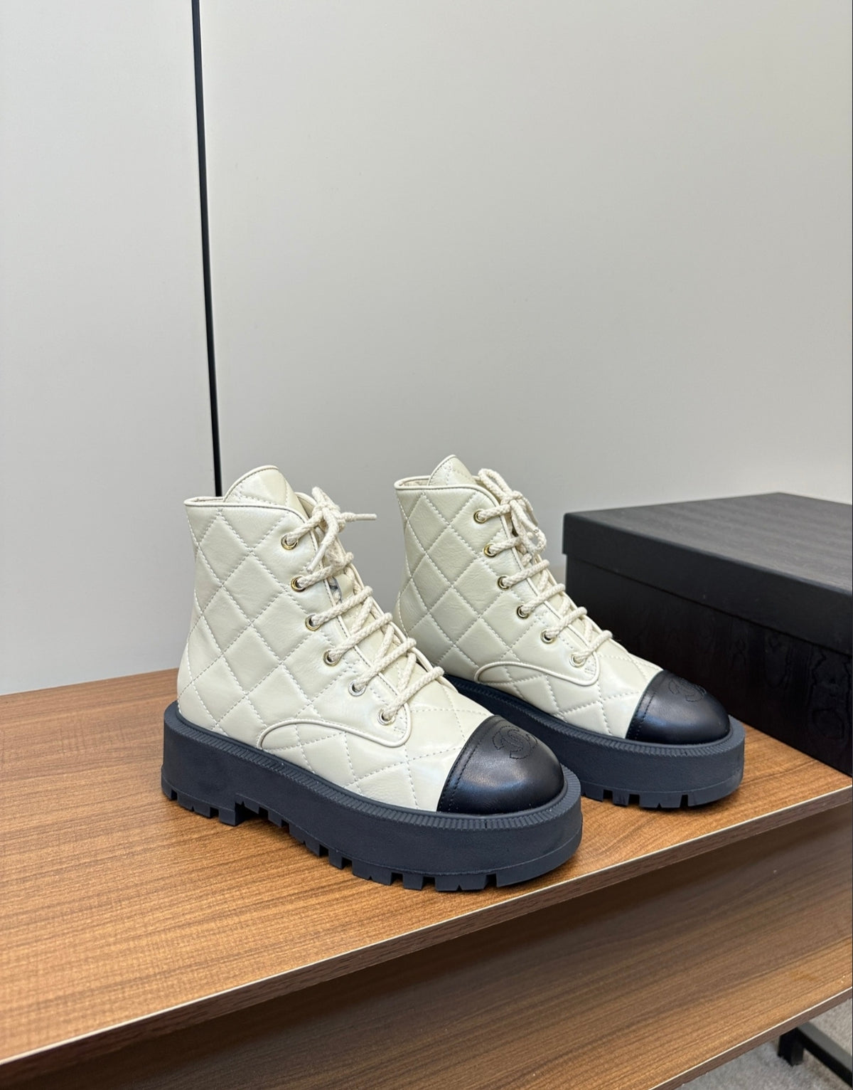 CHANEL QUILTED LACE-UP COMBAT BOOTS – IVORY / BLACK