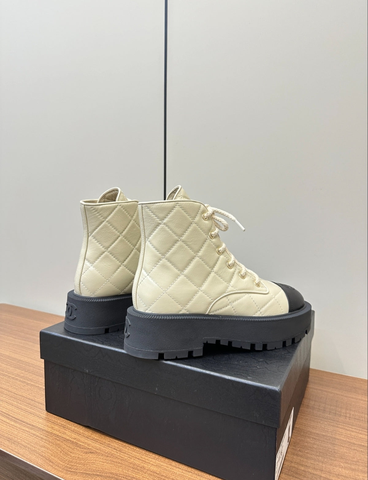CHANEL QUILTED LACE-UP COMBAT BOOTS – IVORY / BLACK