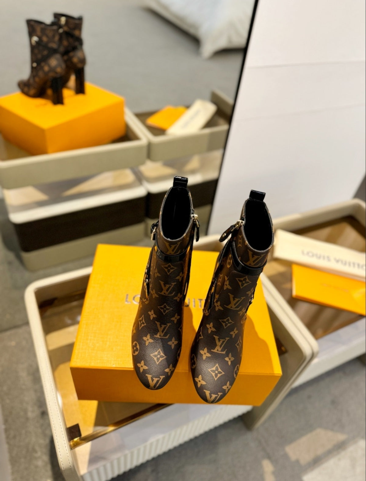 LOUIS VUITTON MONOGRAM BELTED ANKLE BOOTS
