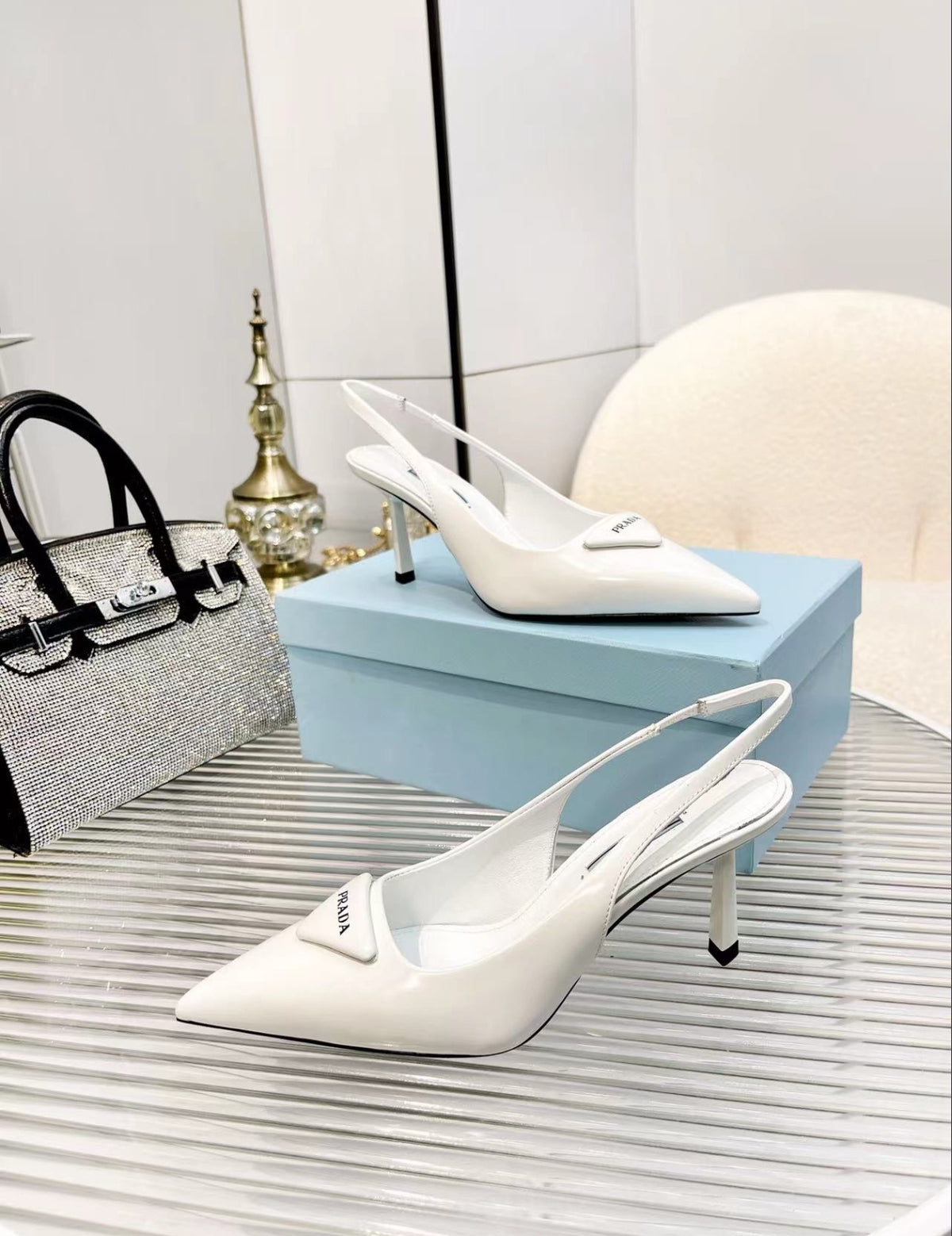 Prada Triangle Logo Slingback Pumps